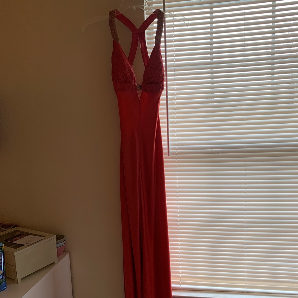 Coral evening gown with gold beading